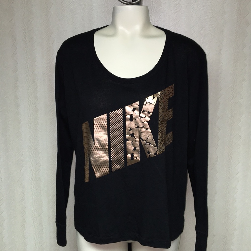 Nike shirt with gold letters